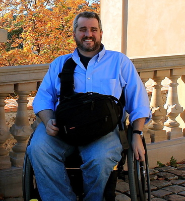 picture of peter collman in a wheelchair